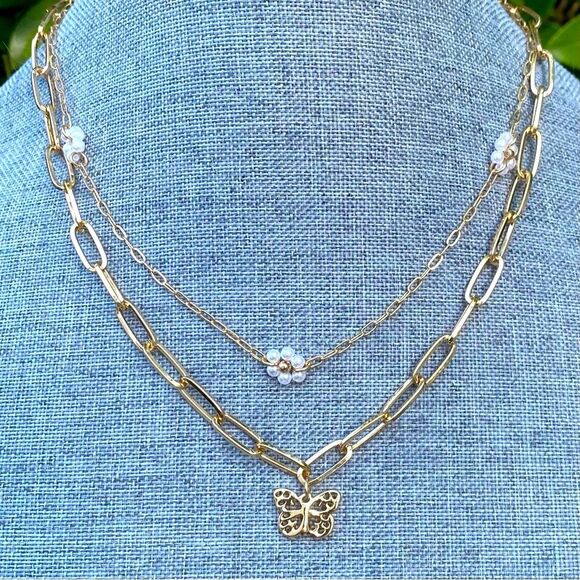Two Urban Outfitters (OU) Gold Butterfly/White Pearl Flower Layer Necklaces NWT - Picture 1 of 9